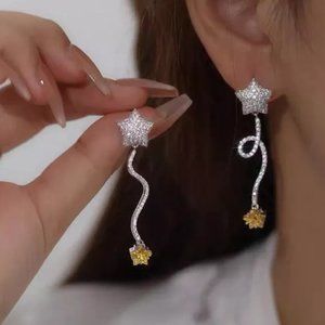 ASYMMETRIC EARRINGS OF STARS WITH MICRO ZIRCON / 925 STERLING SILVER